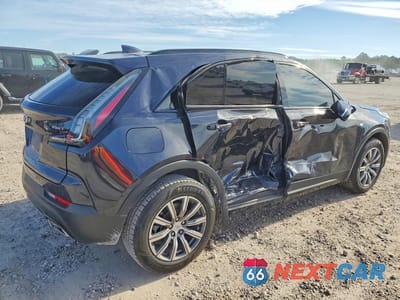 Trzecie zdjęcie samochodu z tyłu: 2023 CADILLAC XT4 SPORT VIN:1GYFZER40PF209095 - miniatura
