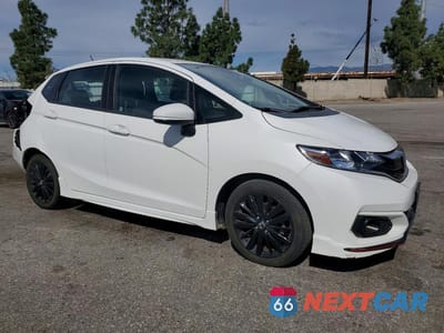 Czwarte zdjęcie samochodu z boku: 2018 HONDA FIT SPORT VIN:3HGGK5H62JM715926 - miniatura