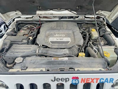 Zdjęcie 7 z 12 samochodu: 2015 JEEP WRANGLER UNLIMITED SAHARA VIN:1C4BJWEGXFL540381 - miniatura