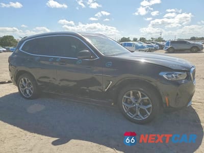 Czwarte zdjęcie samochodu z boku: 2024 BMW X3 XDRIVE30I VIN:5UX53DP09R9V39251 - miniatura