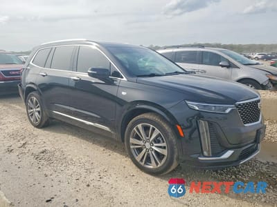 Czwarte zdjęcie samochodu z boku: 2022 CADILLAC XT6 PREMIUM LUXURY VIN:1GYKPCRS5NZ100005 - miniatura