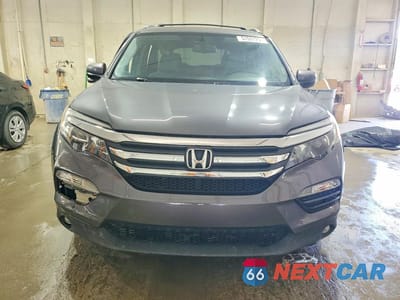 Piąte zdjęcie samochodu w środku: 2016 HONDA PILOT EXL VIN:5FNYF6H52GB089084 - miniatura