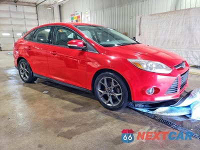 Czwarte zdjęcie samochodu z boku: 2013 FORD FOCUS SE VIN:1FADP3F29DL320421 - miniatura