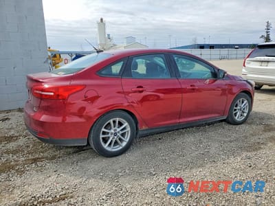 Trzecie zdjęcie samochodu z tyłu: 2015 FORD FOCUS SE VIN:1FADP3F21FL229016 - miniatura
