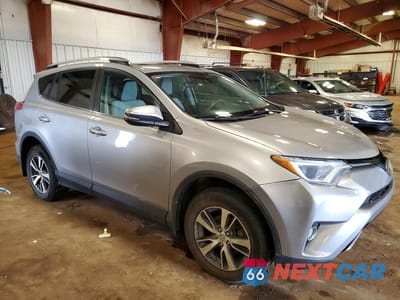 Czwarte zdjęcie samochodu z boku: 2018 TOYOTA RAV4 XLE VIN:2T3RFREV8JW761886 - miniatura
