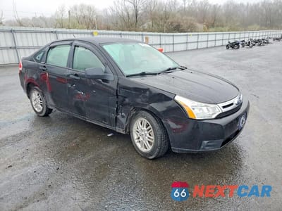 Czwarte zdjęcie samochodu z boku: 2009 FORD FOCUS SE VIN:1FAHP35N49W241712 - miniatura