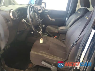 Zdjęcie 7 z 12 samochodu: 2013 JEEP WRANGLER UNLIMITED SAHARA VIN:1C4BJWEG3DL585465 - miniatura