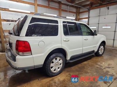 Trzecie zdjęcie samochodu z tyłu: 2004 LINCOLN TOWNHOUSE AVIATOR VIN:5LMEU88H14ZJ49885 - miniatura