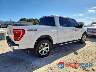 Trzecie zdjęcie samochodu z tyłu: 2023 FORD F150 SUPERCREW VIN:1FTFW1E53PFB25777 - miniatura