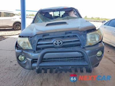 Piąte zdjęcie samochodu w środku: 2011 TOYOTA TACOMA V6 VIN:3TMLU4EN8BM067863 - miniatura