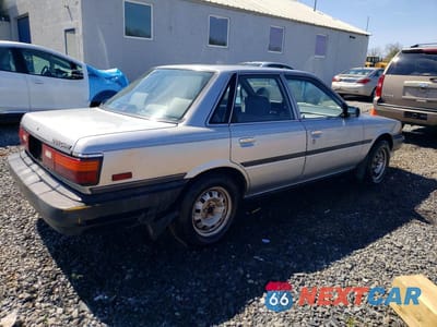 Trzecie zdjęcie samochodu z tyłu: 1990 TOYOTA CAMRY BASE VIN:4T1SV24E7LU111567 - miniatura