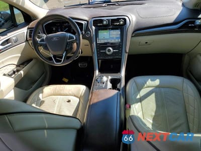 Zdjęcie 8 z 12 samochodu: 2017 FORD FUSION TITANIUM VIN:3FA6P0D93HR273417 - miniatura