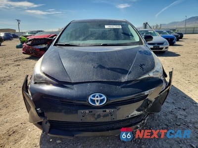 Piąte zdjęcie samochodu w środku: 2016 TOYOTA PRIUS TWO VIN:JTDKBRFU3G3016557 - miniatura