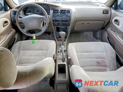 Zdjęcie 8 z 12 samochodu: 1997 TOYOTA COROLLA DX VIN:1NXBB02E5VZ588419 - miniatura