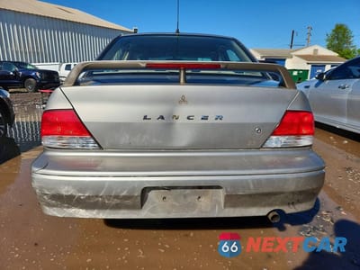 Zdjęcie 6 z 12 samochodu: 2002 MITSUBISHI LANCER ES VIN:JA3AJ26E42U062138 - miniatura