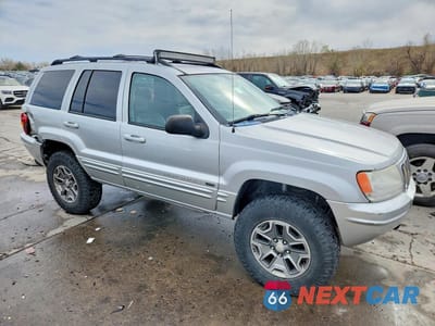Czwarte zdjęcie samochodu z boku: 2003 JEEP GRAND CHEROKEE LIMITED VIN:1J4GW58J83C568582 - miniatura