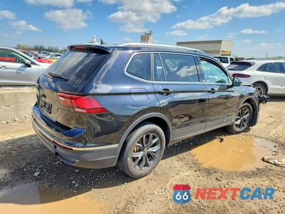 Trzecie zdjęcie samochodu z tyłu: 2024 VOLKSWAGEN TIGUAN SE VIN:3VV3B7AX8RM049860 - miniatura