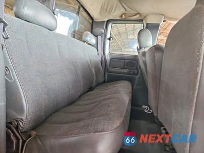 Zdjęcie 10 z 12 samochodu: 2004 GMC SIERRA VIN:1GTHC29U24E387428 - miniatura
