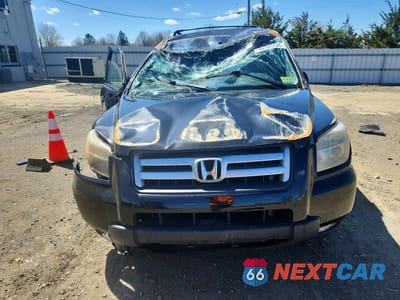 Piąte zdjęcie samochodu w środku: 2007 HONDA PILOT EX VIN:2HKYF18407H507587 - miniatura