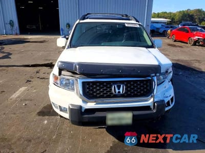 Piąte zdjęcie samochodu w środku: 2013 HONDA RIDGELINE RTL VIN:5FPYK1F58DB009534 - miniatura