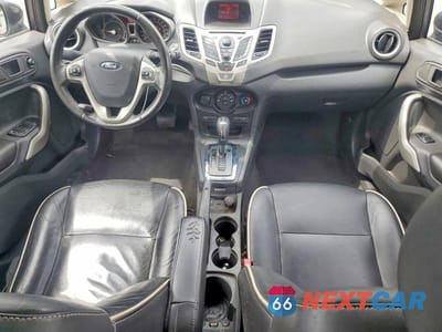 Zdjęcie 8 z 11 samochodu: 2013 FORD FIESTA TITANIUM VIN:3FADP4FJ3DM173380 - miniatura
