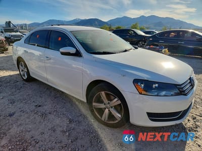 Czwarte zdjęcie samochodu z boku: 2014 VOLKSWAGEN PASSAT SE VIN:1VWBS7A34EC049757 - miniatura