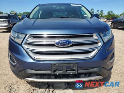 Piąte zdjęcie samochodu w środku: 2018 FORD EDGE TITANIUM VIN:2FMPK3K96JBB37512 - miniatura
