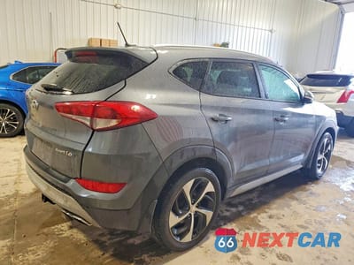 Trzecie zdjęcie samochodu z tyłu: 2017 HYUNDAI TUCSON SPORT VIN:KM8J33A29HU284435 - miniatura