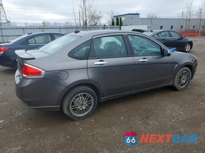 Trzecie zdjęcie samochodu z tyłu: 2011 FORD FOCUS SE VIN:1FAHP3FN8BW156182 - miniatura