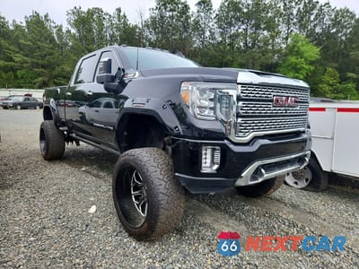 Czwarte zdjęcie samochodu z boku: 2021 GMC SIERRA K2500 DENALI VIN:1GT49REY5MF136010 - miniatura