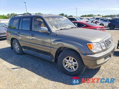 Czwarte zdjęcie samochodu z boku: 2002 LEXUS LX 470 BASE VIN:JTJHT00W023516940 - miniatura