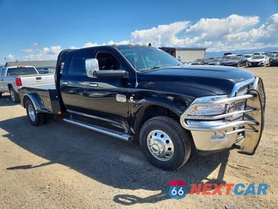 Czwarte zdjęcie samochodu z boku: 2014 RAM 3500 LONGHORN VIN:3C63RRKL5EG108784 - miniatura