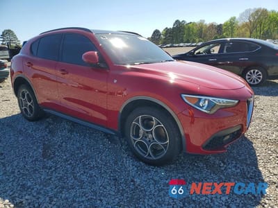 Czwarte zdjęcie samochodu z boku: 2022 ALFA ROMEO STELVIO TI VIN:ZASPAKBN7N7D47332 - miniatura