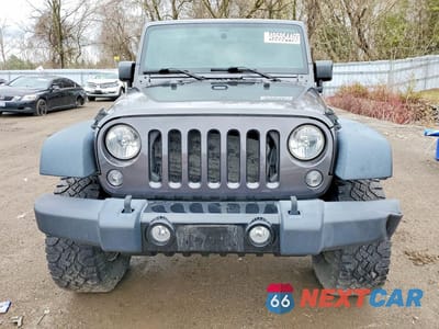 Piąte zdjęcie samochodu w środku: 2016 JEEP WRANGLER SPORT VIN:1C4AJWAG8GL261658 - miniatura