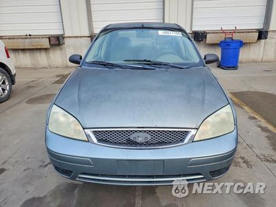 Piąte zdjęcie samochodu w środku: 2005 FORD FOCUS VIN:1FAFP34N95W249436 - miniatura