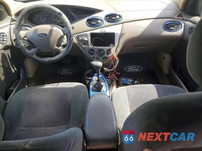 Zdjęcie 8 z 12 samochodu: 2002 FORD FOCUS ZX5 VIN:3FAFP37372R139932 - miniatura