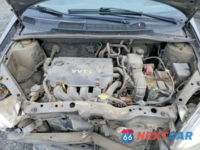 Zdjęcie 11 z 13 samochodu: 2003 TOYOTA ECHO BASE VIN:JTDBT123330297962 - miniatura