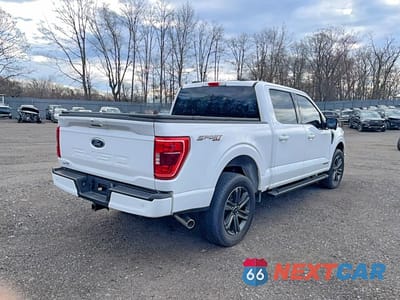 Czwarte zdjęcie samochodu z boku: 2023 FORD F150 SUPERCREW VIN:1FTFW1ED0PFD09162 - miniatura