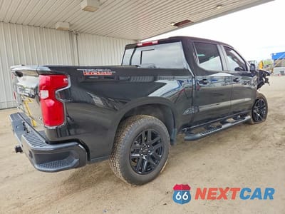 Trzecie zdjęcie samochodu z tyłu: 2024 CHEV SILVERADO K1500 LT TRAIL BOSS VIN:3GCUDFE89RG423790 - miniatura