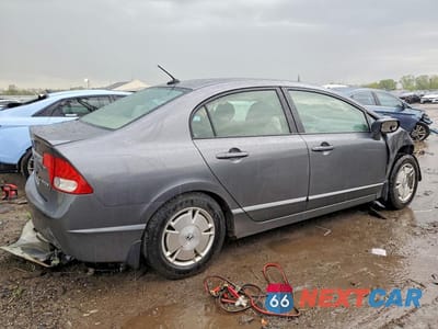 Trzecie zdjęcie samochodu z tyłu: 2010 HONDA CIVIC HYBRID VIN:JHMFA3F28AS006098 - miniatura