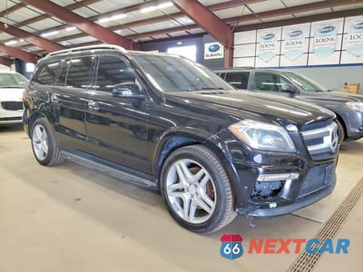 Czwarte zdjęcie samochodu z boku: 2015 MERCEDES-BENZ GL 550 4MATIC VIN:4JGDF7DEXFA453510 - miniatura
