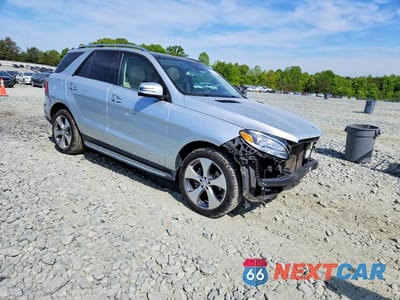 Czwarte zdjęcie samochodu z boku: 2017 MERCEDES-BENZ GLE 350 4MATIC VIN:4JGDA5HB0HA877817 - miniatura
