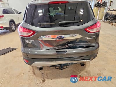 Zdjęcie 6 z 12 samochodu: 2015 FORD ESCAPE TITANIUM VIN:1FMCU9JX8FUB01110 - miniatura