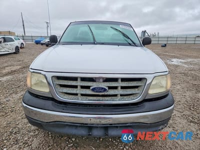 Piąte zdjęcie samochodu w środku: 2001 FORD F150 VIN:1FTPF17M01KB25596 - miniatura