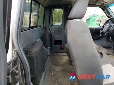 Zdjęcie 10 z 12 samochodu: 2011 FORD RANGER SUPER CAB VIN:1FTKR4EE1BPB22533 - miniatura