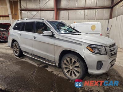 Czwarte zdjęcie samochodu z boku: 2017 MERCEDES-BENZ GLS 450 4MATIC VIN:4JGDF6EEXHA813046 - miniatura