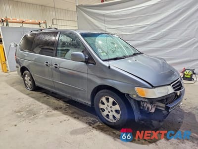 Czwarte zdjęcie samochodu z boku: 2002 HONDA ODYSSEY EX VIN:5FNRL18622B043658 - miniatura