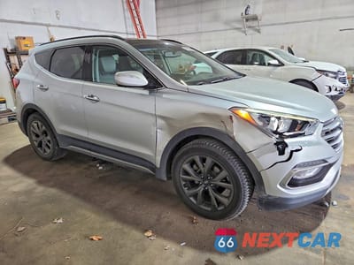 Czwarte zdjęcie samochodu z boku: 2017 HYUNDAI SANTA FE SPORT 2.0T ULTIMATE VIN:5XYZWDLA5HG446152 - miniatura