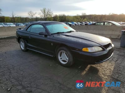 Czwarte zdjęcie samochodu z boku: 1997 FORD MUSTANG VIN:1FALP444XVF151502 - miniatura