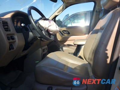 Zdjęcie 7 z 13 samochodu: 2004 FORD ESCAPE LIMITED VIN:1FMCU94164KB68904 - miniatura